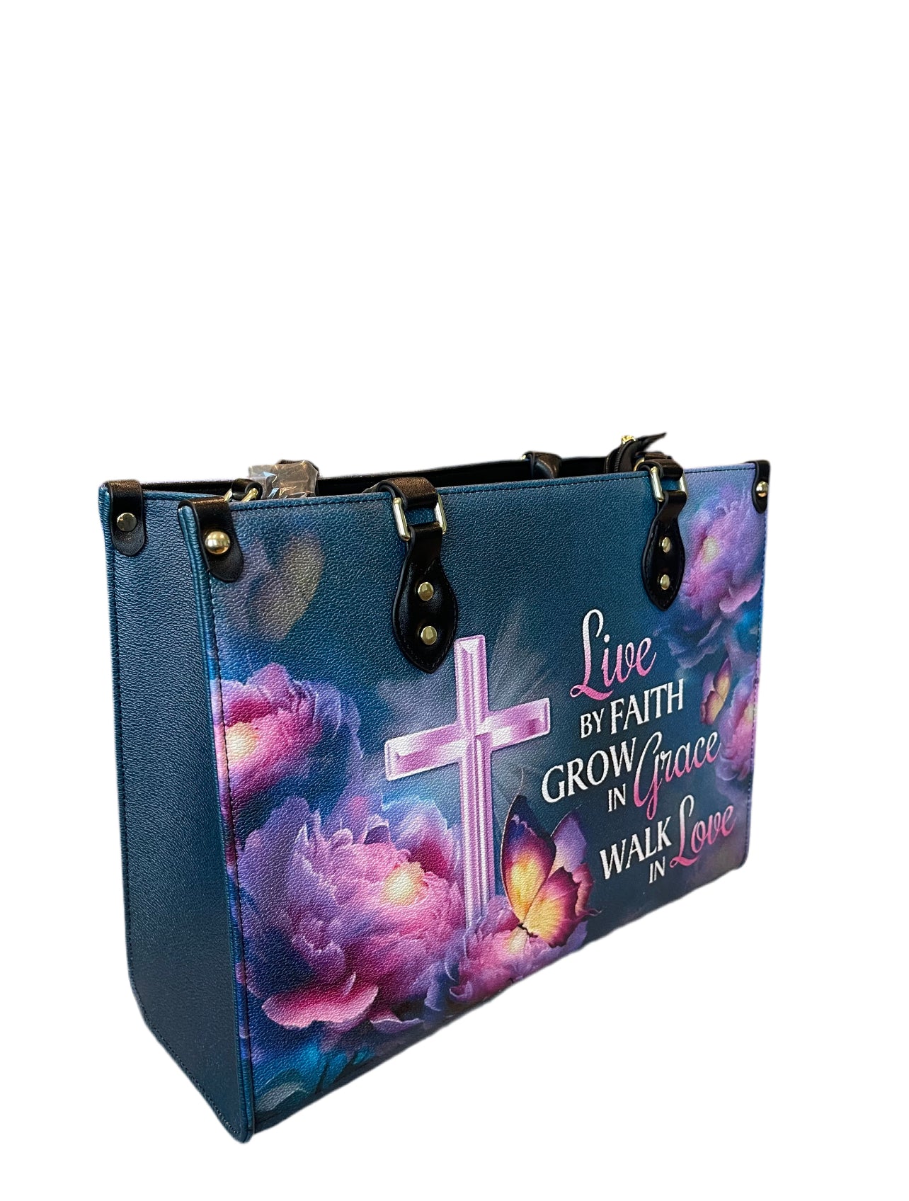 High quality leather handbags for elegant women. Live by faith grow in grace walk in love